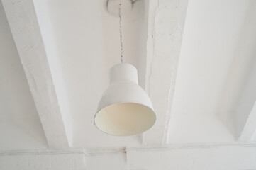 White metal plafond on the ceiling. Light interior, loft style.
