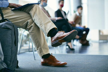 Fototapeta premium Unrecognizable male candidate waiting for a job interview.