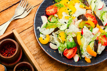Vegetable salad decorated with rice paper,vegan food