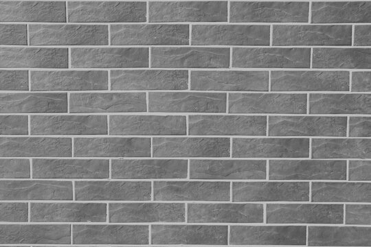Fototapeta Brick wall with grey brick, grey brick texture or background.