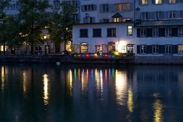 Fototapeta premium Old town of Zurich with river Limmat by night at summertime. Photo taken June 5th, 2021, Zurich, Switzerland.