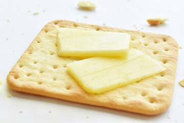 Crackers and cheese on white background.  Healthy and dietary food. 