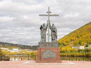 Fototapeta na wymiar Kamchatka Peninsula, Russia - October 1, 2018: Bronze monument depicting the apostles Peter and Paul. The monument was erected in the central square near the lake.