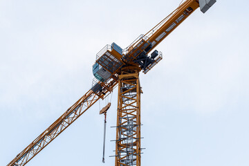 Construction crane detail against a blue sky