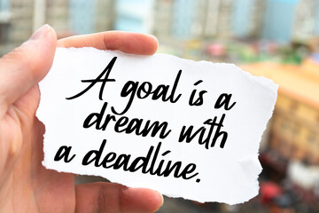 Inspirational motivational quote. A goal is a dream with a deadline.