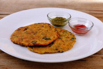 Variety of Indian flat bread thepla or paratha