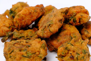 Indian snack pakora in white plate