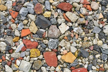 Close up of crushed building rubble stones. Construction waste 