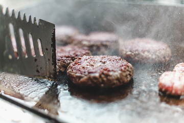 burgers on grill