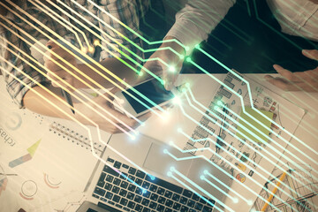 Double exposure of data theme hologram drawing and man and woman working together holding and using a mobile device.