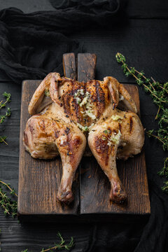 Freshly Cooked Rotisserie Chicken, On Black Wooden Table