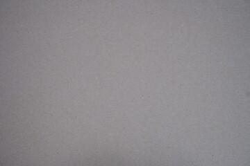 Black background. The texture of the cardboard.