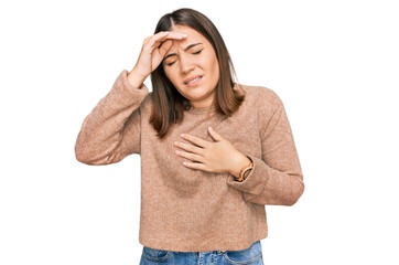 Young beautiful woman wearing casual clothes touching forehead for illness and fever, flu and cold, virus sick