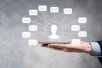 Male hand holding letter icon,email icons .Contact us by newsletter email and protect your personal...