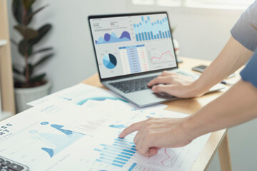 Businesspeople working in finance and accounting Analyze financial graph budget and planning for...