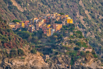 Fototapeta na wymiar Corniglia, Colorful cityscape on the mountains over Mediterranean sea in Cinque Terre Italy
