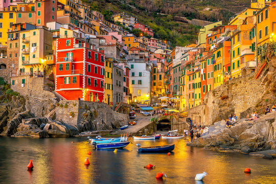 Riomaggiore,  Colorful cityscape on the mountains over Mediterranean sea in Cinque Terre Italy