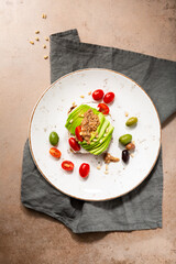 Avocado toast with cheese on plate