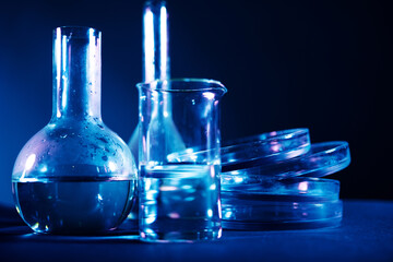 Test tubes flasks and petri dishes, laboratory glassware. Medicine and biological or chemical research,