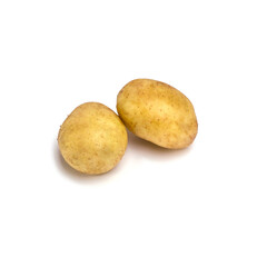 Two young potatoes isolated on white background