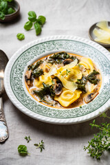 Ravioli Soup in a bowl with kale