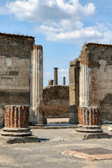 Archaeological Park of Pompeii. The remains of the Basilica, the most sumptuous building of the Forum. Campania, Italy