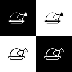 Set Roasted turkey or chicken icon isolated on black and white background. Vector