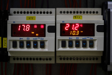 Control unit for the temperature next to each other in the switchboard.