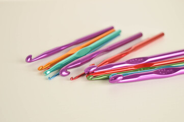 colorful metal crochet hooks close up