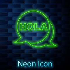 Glowing neon line Hola icon isolated on brick wall background. Vector © vector_v