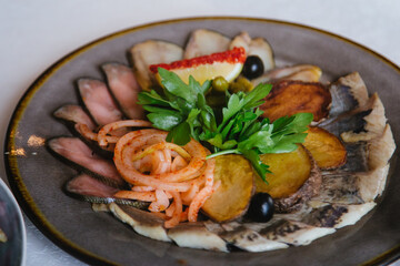 Herring, onion and potato appetizer