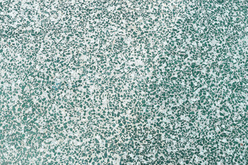 Texture of granite chips in concrete close-up