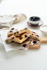 Low-carb pancakes with blueberries and yogurt. Keto diet concept.