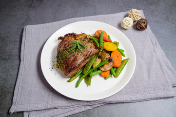 grilled beef steak and vegetables