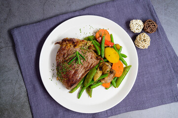 grilled beef steak and vegetables