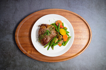grilled beef steak and vegetables