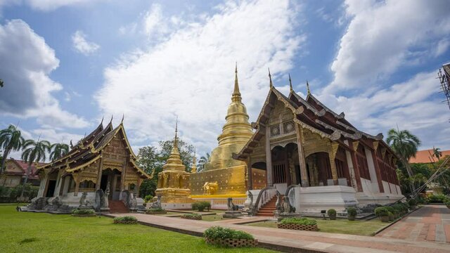 Chiang Mai, Thailand - June 5, 2021 : VIDEO Timelapse of Wat Phra Singh temple on cloudy day. Wat Phra Singh is one of the most famous temple in the north Thailand.