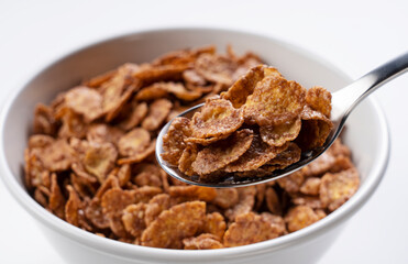 Chocolate cornflakes on a spoon