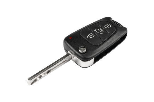 Modern wireless car key ignition isolated on white background. Wireless start engine key. Car key remote isolated over white. Modern car keys. Car keys close up.