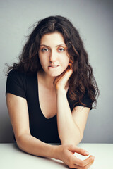 Portrait of a young emotional beautiful curly girl. Photography tests for an actress © Radarani