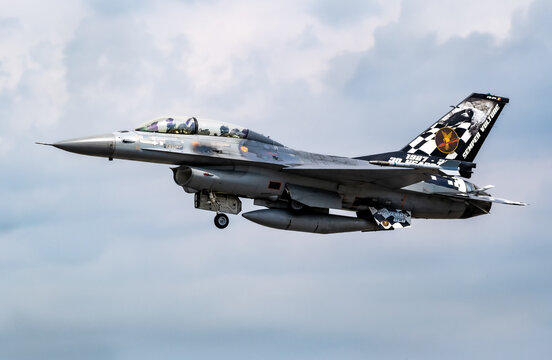 Special livery Belgian Air Force F-16B dual seater fighter jet taking off from Florennes Air Base. 