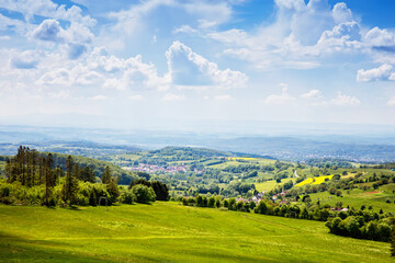 Landscape on Hoherodskopf, volcano region in Hesse, Germany. On cloudy sunny warm summer day,...