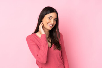 Fototapeta premium Young caucasian woman over isolated background laughing