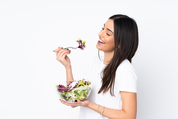 Young woman with salad isolated on white background