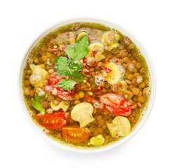 Bowl of tasty lentil soup on white background