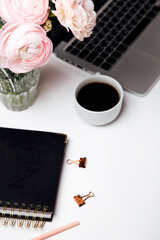 white office desk with blank laptop, computer, supplies and coffee cups. Top view with copy space. flat lay .