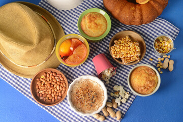 Traditional food for Festa Junina (June Festival) on color background