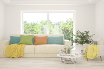 White living room with sofa and summer landscape in window. Scandinavian interior design. 3D illustration