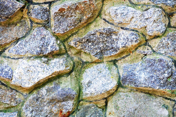 Texture of stone blocks. gray Stone background. Texture of a granite wall. a background with beautiful the drawing on a curbstone