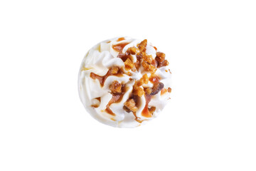 Caramel nuts vanilla ice cream in waffle cone on a white isolated background